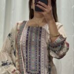 Featuring Lilac Silks Suit which is beautifully decorated with digital prints and hand embroidery and hand works. It is absolutely perfect for your upcoming occasions, it is very easy breezy and comfortable.